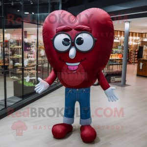 Maroon Heart Shaped Balloons mascot costume character dressed with a Boyfriend Jeans and Eyeglasses