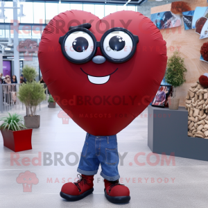 Maroon Heart Shaped Balloons mascot costume character dressed with a Boyfriend Jeans and Eyeglasses