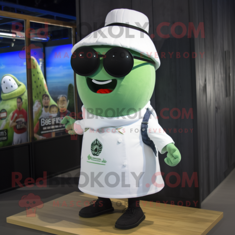 White Cucumber mascot costume character dressed with a Polo Tee and Eyeglasses