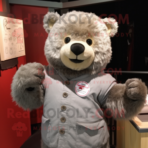 Gray Teddy Bear mascot costume character dressed with a Henley Tee and Shawl pins
