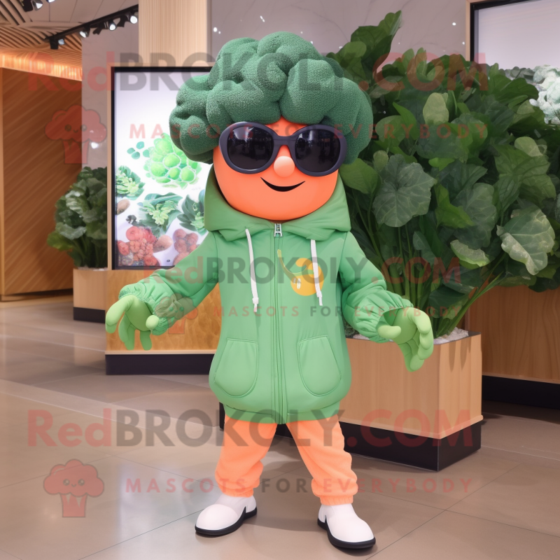 Peach Broccoli mascot costume character dressed with a Long Sleeve Tee and Sunglasses