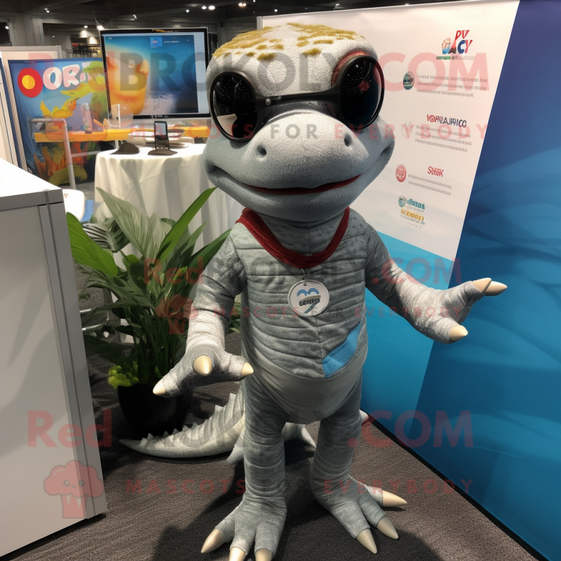 Gray Geckos mascot costume character dressed with a Rash Guard and Tie pins