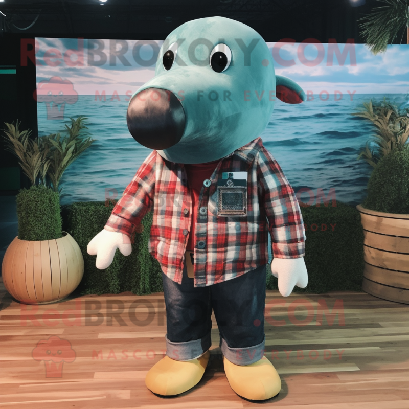 Olive Whale mascot costume character dressed with a Flannel Shirt and Keychains