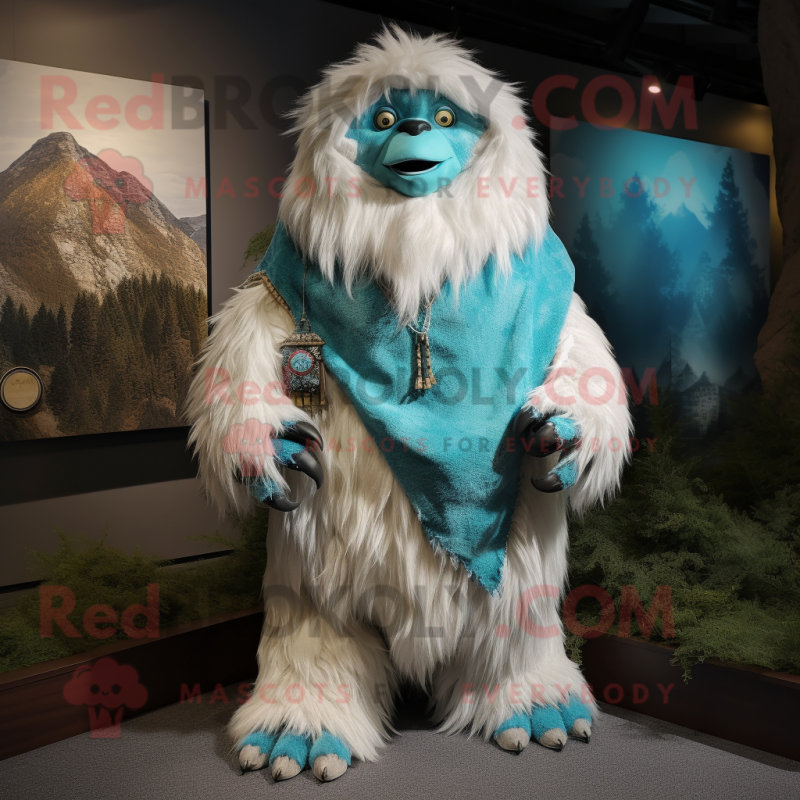 Turquoise Yeti mascot costume character dressed with a Poplin Shirt and Shawl pins