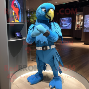 Sky Blue Macaw mascot costume character dressed with a Rash Guard and Smartwatches