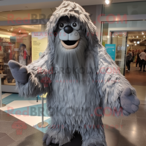 Grå Sasquatch maskot...