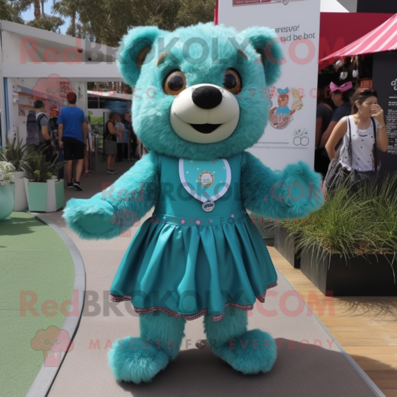 Teal Bear mascot costume character dressed with a Playsuit and Hair clips