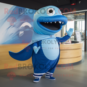 Blue Whale mascot costume character dressed with a Graphic Tee and Rings