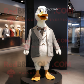 nan Geese mascot costume character dressed with a Jacket and Tie pins