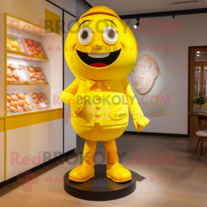 Yellow Candy Box mascot costume character dressed with a Jeggings and Brooches