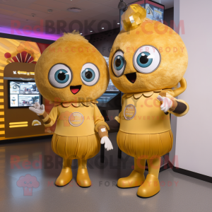 Gold Meatballs mascot costume character dressed with a A-Line Dress and Smartwatches