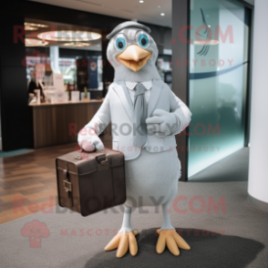 Silver Seagull mascot costume character dressed with a Shift Dress and Briefcases