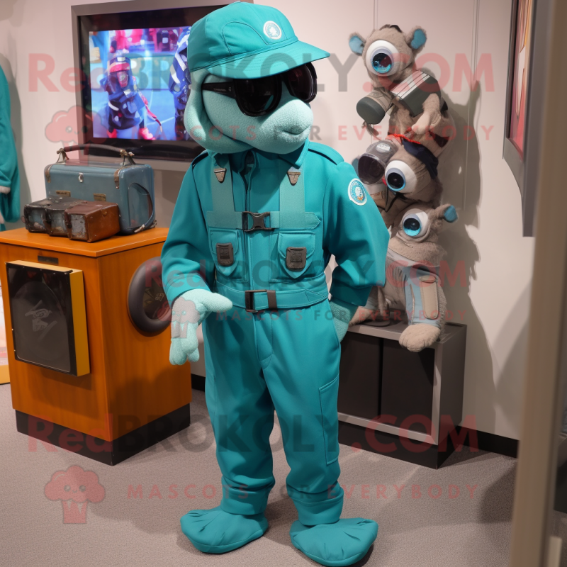 Teal Commando mascot costume character dressed with a Bermuda Shorts and Tie pins