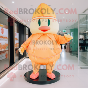 Peach Dim Sum mascot costume character dressed with a Shorts and Foot pads