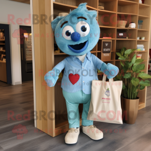 Turquoise Heart mascot costume character dressed with a Chambray Shirt and Tote bags