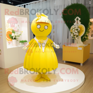 Yellow Lemon mascot costume character dressed with a Wedding Dress and Handbags