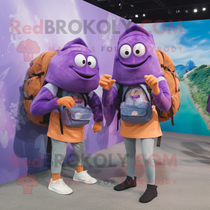 Purple Hermit Crab mascot costume character dressed with a Boyfriend Jeans and Backpacks