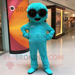 Teal Candy Box mascot costume character dressed with a Jumpsuit and Sunglasses