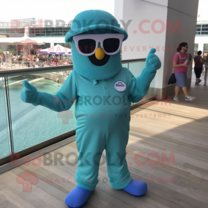 Teal Candy Box mascot costume character dressed with a Jumpsuit and Sunglasses