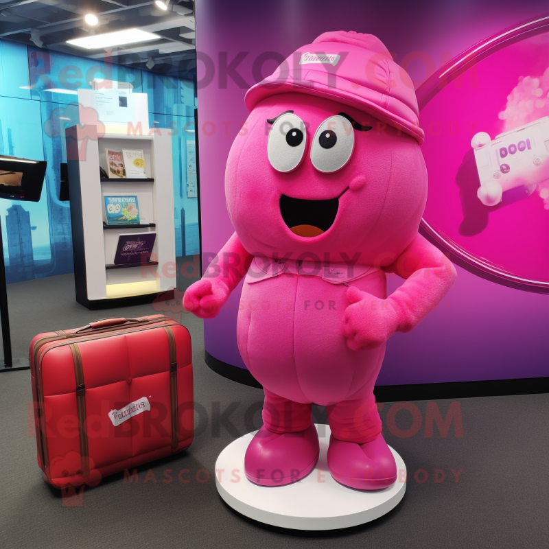 Pink Candy mascot costume character dressed with a Rash Guard and Briefcases