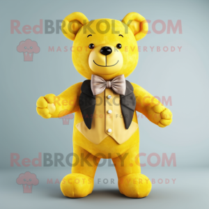 Yellow Teddy Bear mascot costume character dressed with a Vest and Bow ties