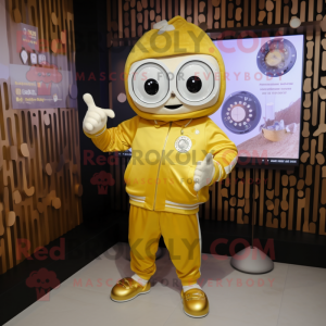 Gold Shakshuka mascot costume character dressed with a Sweatshirt and Digital watches