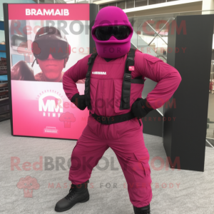 Magenta Para Commando mascot costume character dressed with a Jumpsuit and Sunglasses