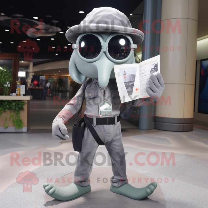 Gray Squid mascot costume character dressed with a Cargo Pants and Reading glasses