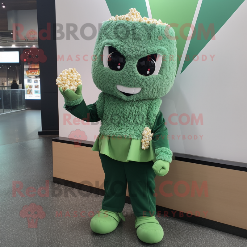Green Pop Corn mascot costume character dressed with a Blouse and Mittens
