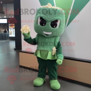 Green Pop Corn mascot costume character dressed with a Blouse and Mittens