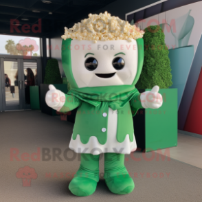 Green Pop Corn mascot costume character dressed with a Blouse and Mittens