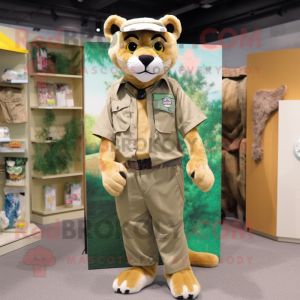 Olive Mountain Lion mascot costume character dressed with a Shorts and Lapel pins