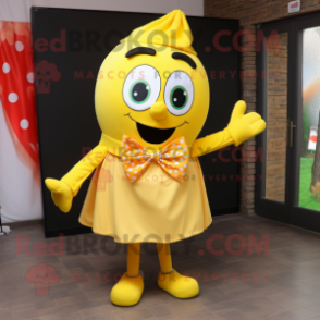 Yellow Shakshuka mascot costume character dressed with a Blouse and Bow ties