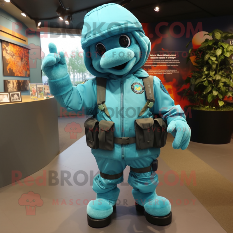 Turquoise Commando mascot costume character dressed with a Parka and Foot pads