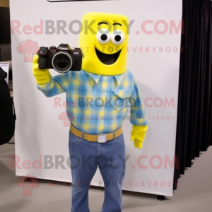 Lemon Yellow Camera mascot costume character dressed with a Flannel Shirt and Cufflinks