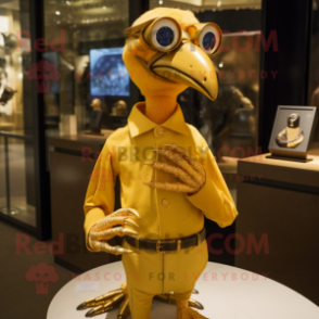 Gold Archeopteryx mascot costume character dressed with a Polo Tee and Cufflinks