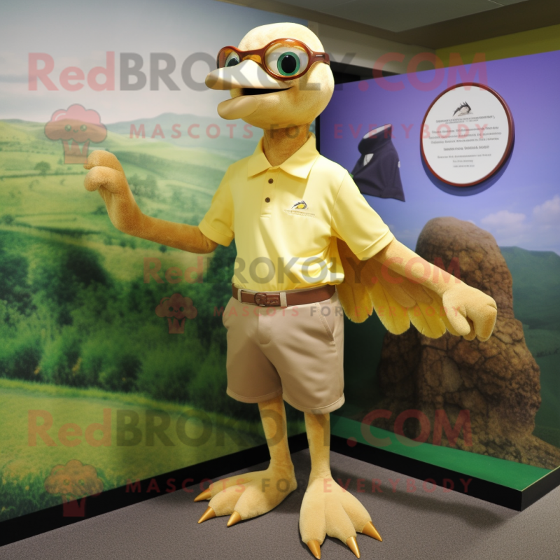 Gold Archeopteryx mascot costume character dressed with a Polo Tee and Cufflinks