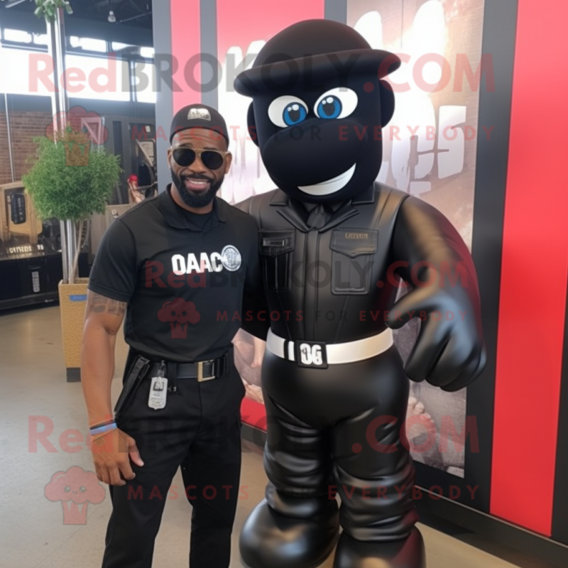 Black Commando mascot costume character dressed with a Mom Jeans and Tie pins