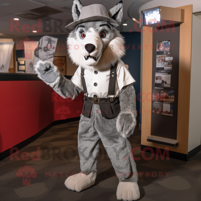 Silver Dingo mascot costume character dressed with a Dress Pants and Hats