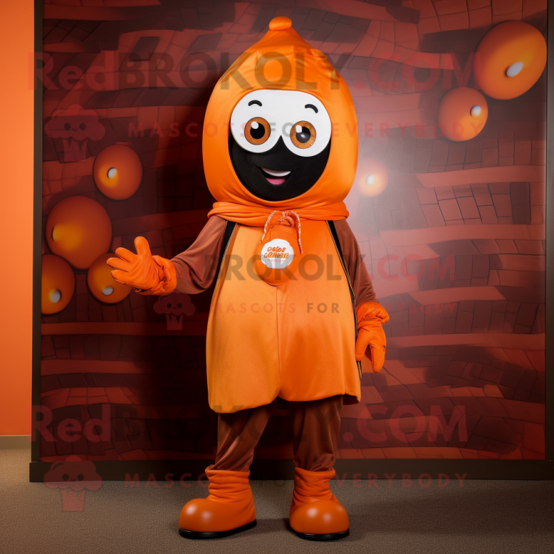 Orange Chocolates mascot costume character dressed with a Hoodie and Beanies