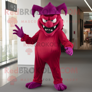 Magenta Devil mascot costume character dressed with a Culottes and Caps