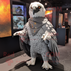 Gray Eagle mascot costume character dressed with a Graphic Tee and Shawls