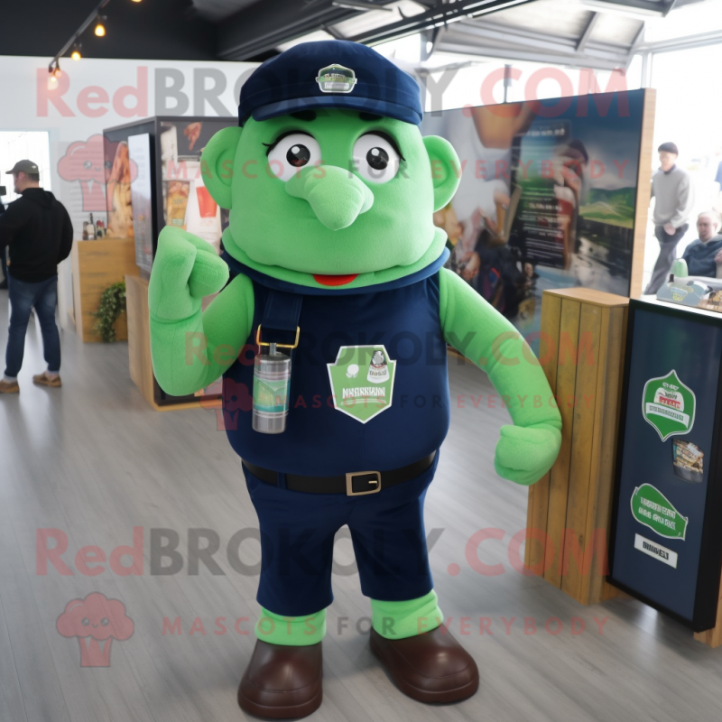 Navy Green Beer mascot costume character dressed with a Dungarees and Messenger bags