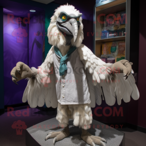Silver Vulture mascot costume character dressed with a Button-Up Shirt and Shawl pins