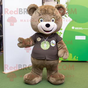 Olive Teddy Bear mascot costume character dressed with a T-Shirt and Lapel pins