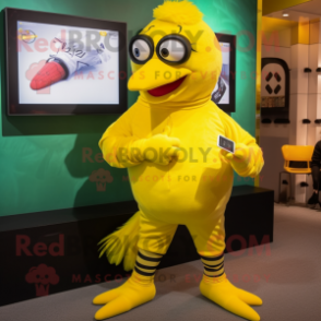 Yellow Crow mascot costume character dressed with a Capri Pants and Smartwatches