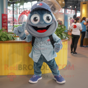 Gray Ceviche mascot costume character dressed with a Denim Shorts and Keychains