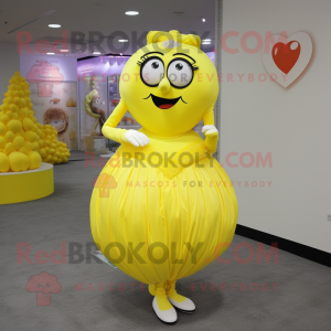 Lemon Yellow Heart mascot costume character dressed with a Ball Gown and Coin purses