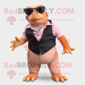 Peach Komodo Dragon mascot costume character dressed with a Waistcoat and Eyeglasses