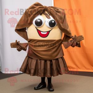 Brown Enchiladas mascot costume character dressed with a Skirt and Bow ties